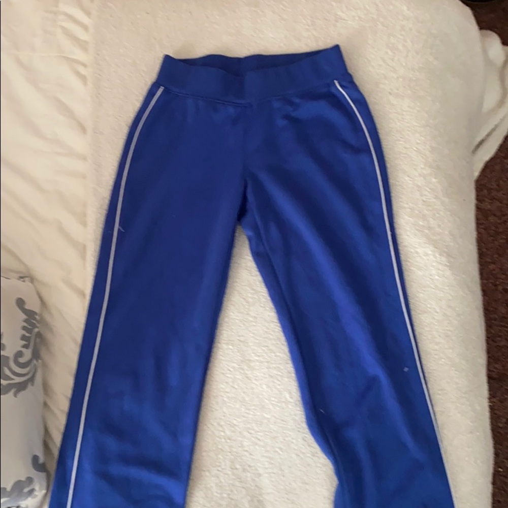 blue sweatpants with white stripes